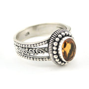 Side View Silver Citrine 6x8mm Oval 3 Band Scroll Ring