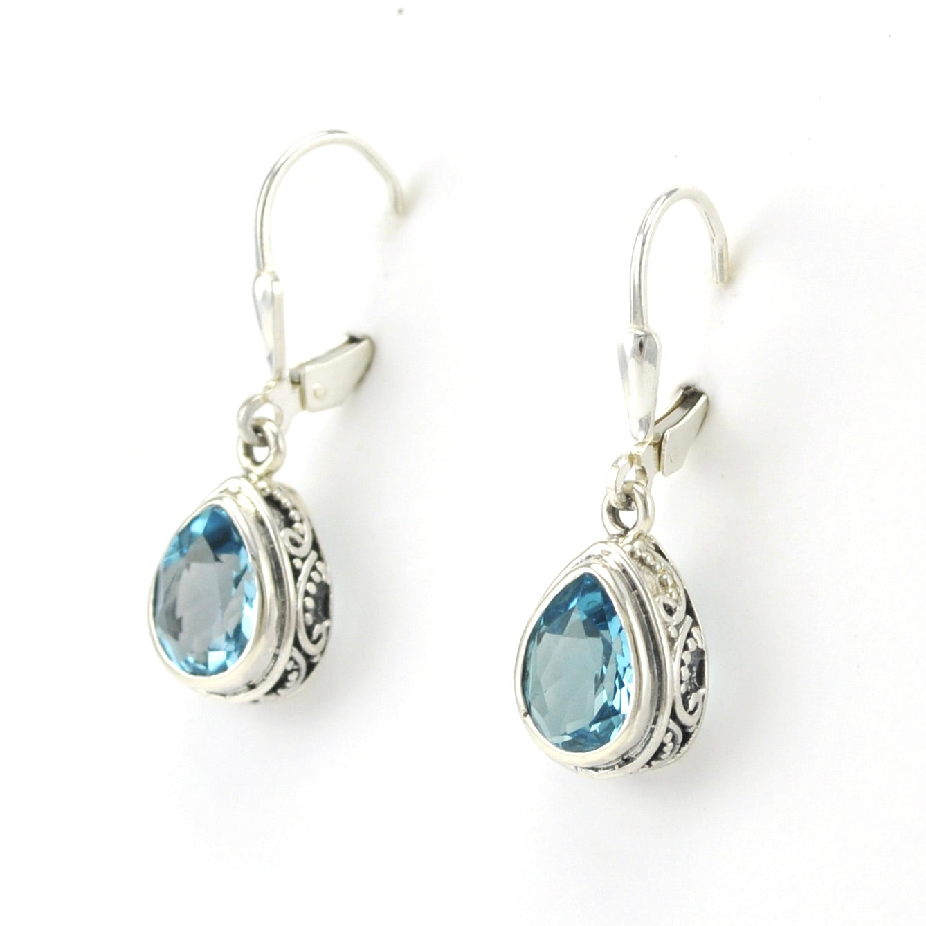Side View Sterling Silver Blue Topaz 7x9mm Tear Dangle Earrings
