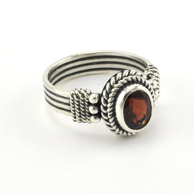 Side View Sterling Silver Garnet 6x8mm Oval Bali Ring
