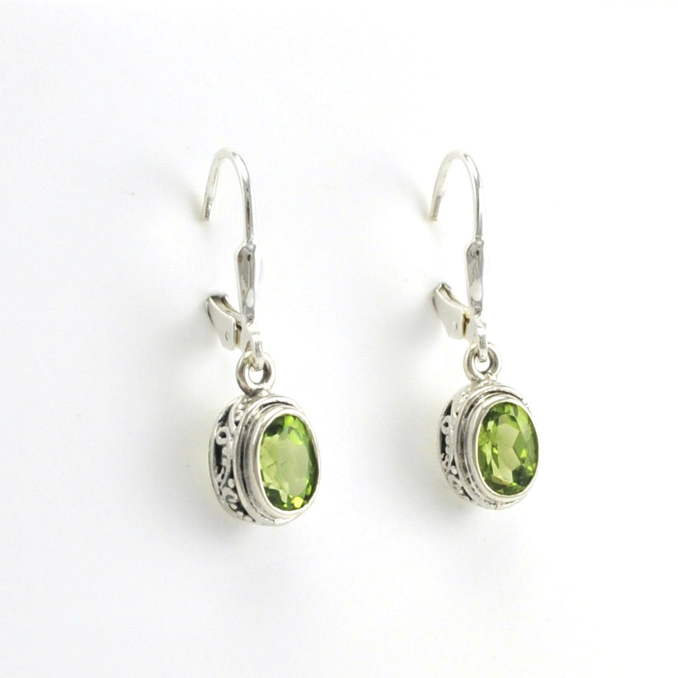 Side View Sterling Silver Peridot 5x7mm Oval Bali Dangle Earrings