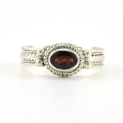 Sterling Silver Garnet 4x6mm Oval Rope Band