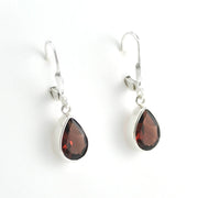 Side View Silver Garnet 7x10mm Teardrop Dangle Earrings