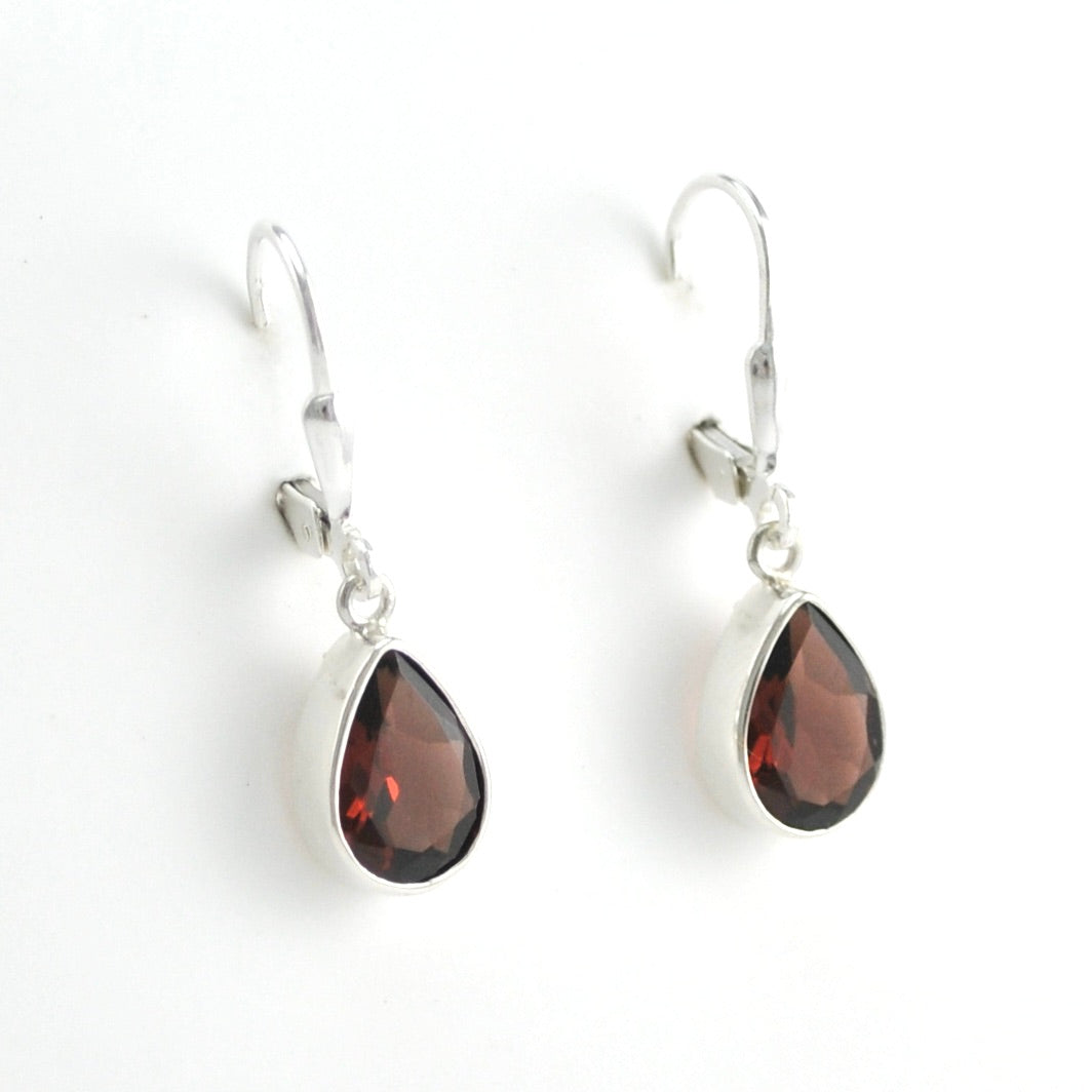 Side View Silver Garnet 7x10mm Teardrop Dangle Earrings
