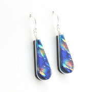 Teardrop-shaped earrings with colorful iridescent finish on a white background
