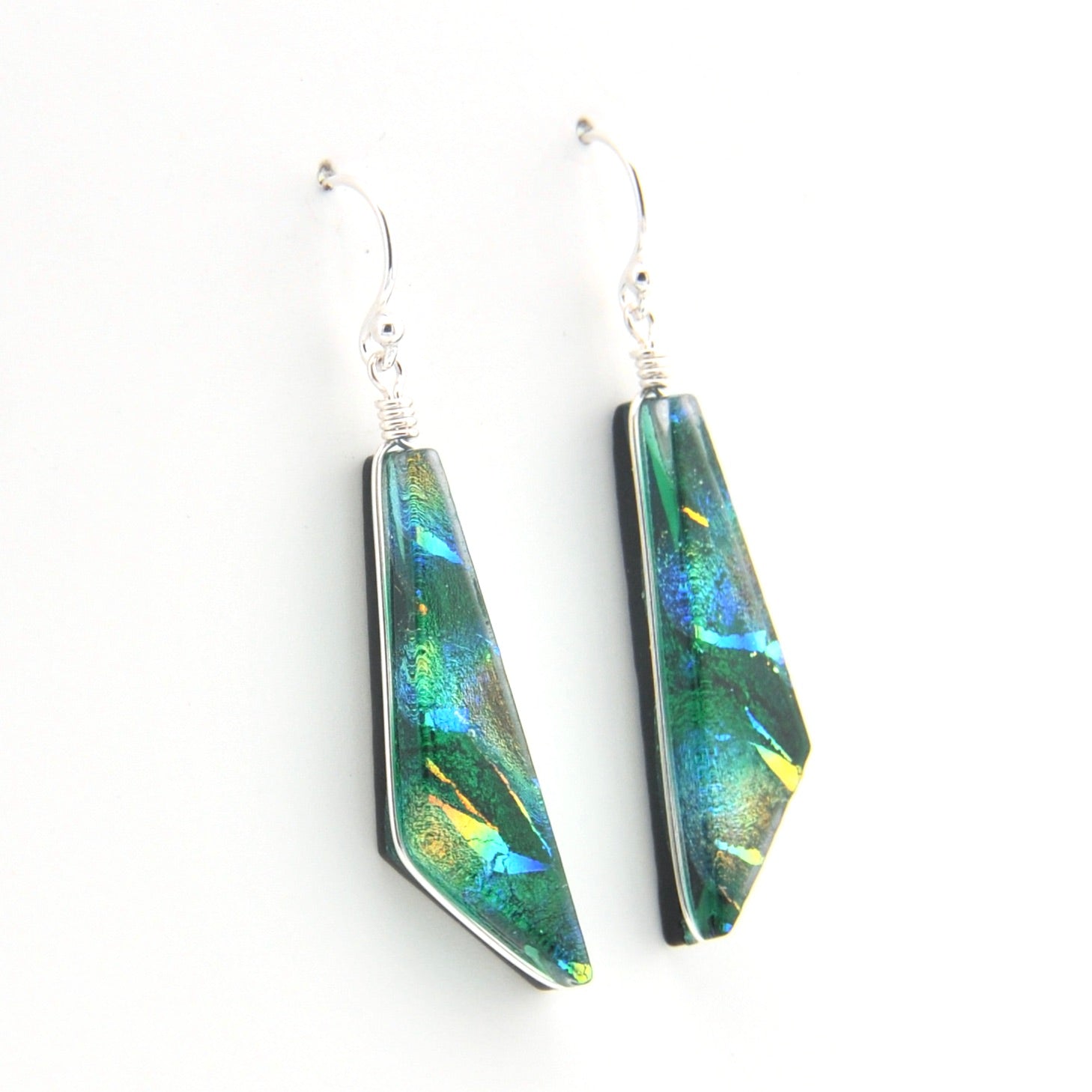 Pair of colorful earrings on a white background