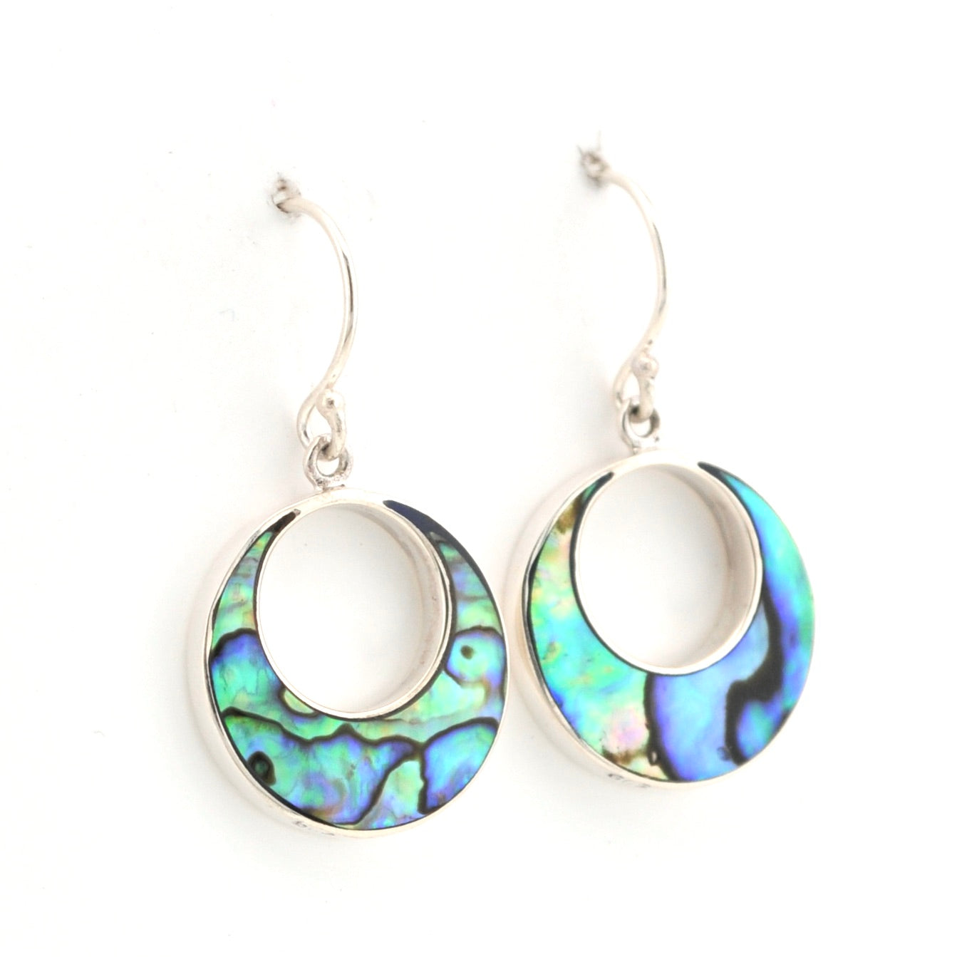 Hoop earrings with colorful abalone shell inlay on a white background