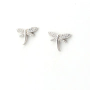Silver dragonfly-shaped earrings on a white background