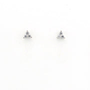 Pair of triangle-shaped earrings with clear stones on a white background