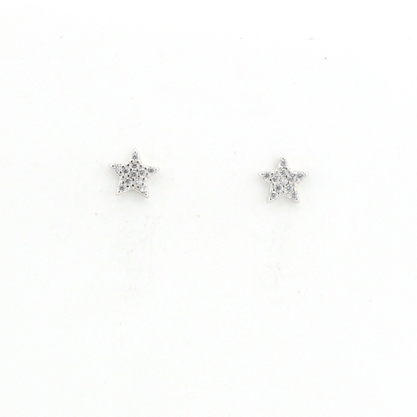 Star-shaped earrings with clear stones on a white background