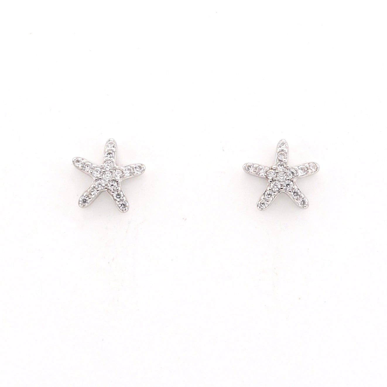 Starfish silver earrings on a white background