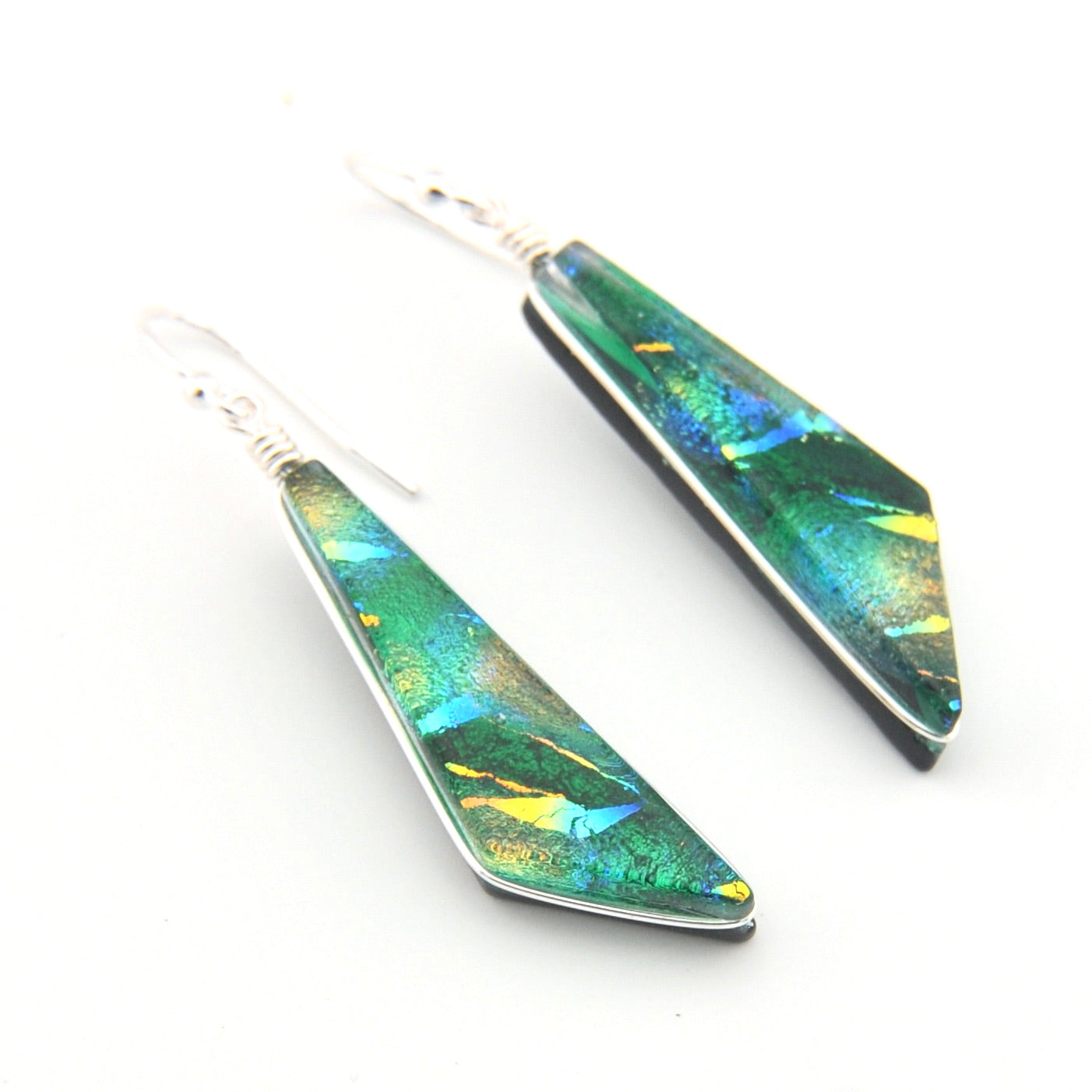 Pair of colorful pendant earrings on a white background