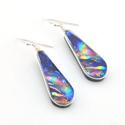 Teardrop-shaped earrings with multicolored iridescent finish on a white background