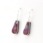 Teardrop-shaped earrings with colorful iridescent finish on a white background