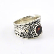Side View Sterling Silver Garnet Oval Wide Ring