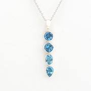 Necklace with blue gemstones on a white background