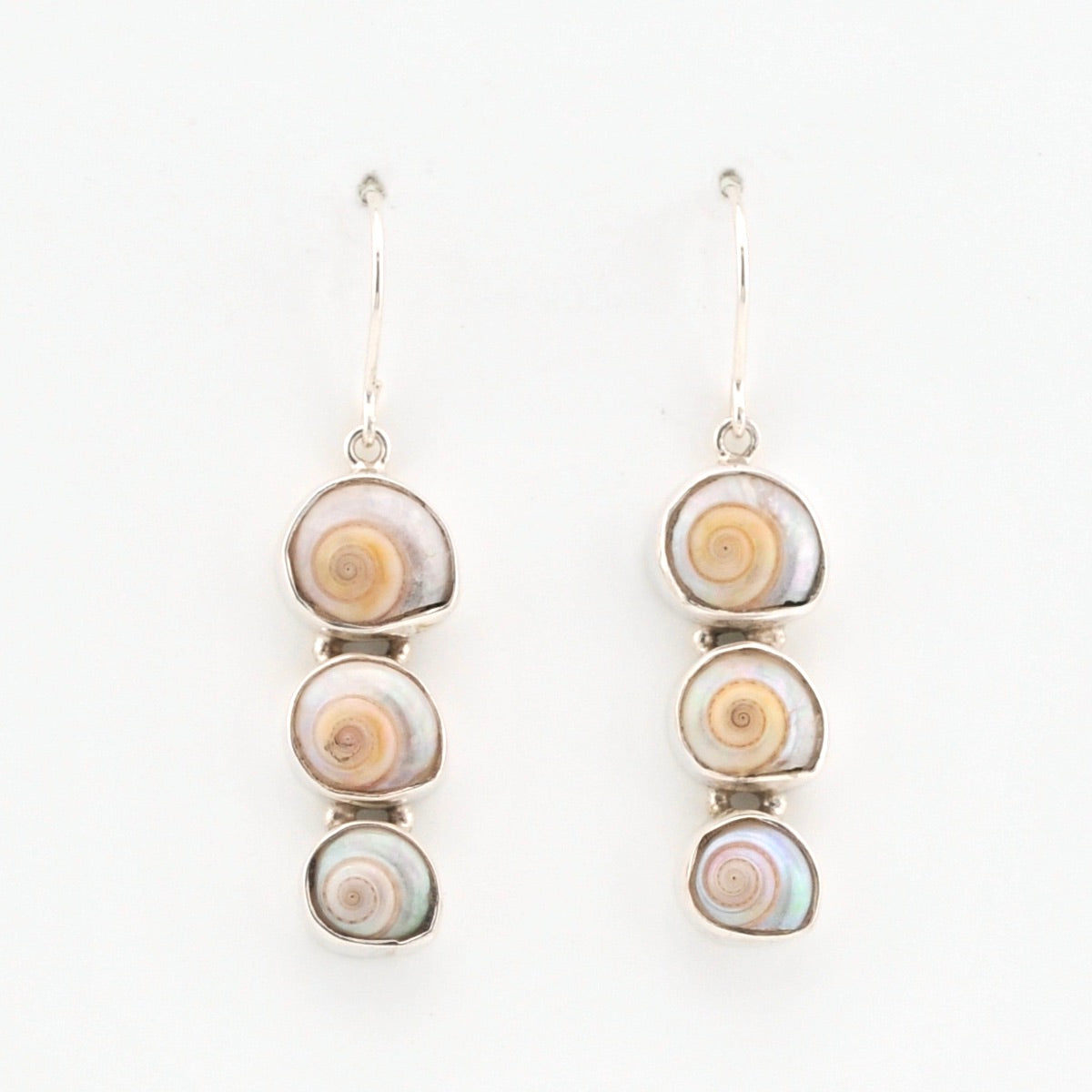 Pair of shell earrings on a white background