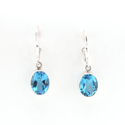 Front View Silver Blue Topaz 8x10mm Oval Dangle Earrings
