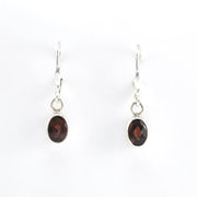 Front View Silver Garnet 5x7mm Oval Dangle Earrings