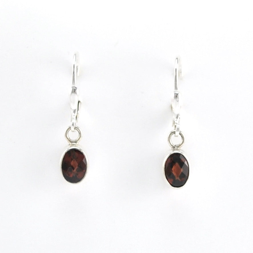 Front View Silver Garnet 5x7mm Oval Dangle Earrings