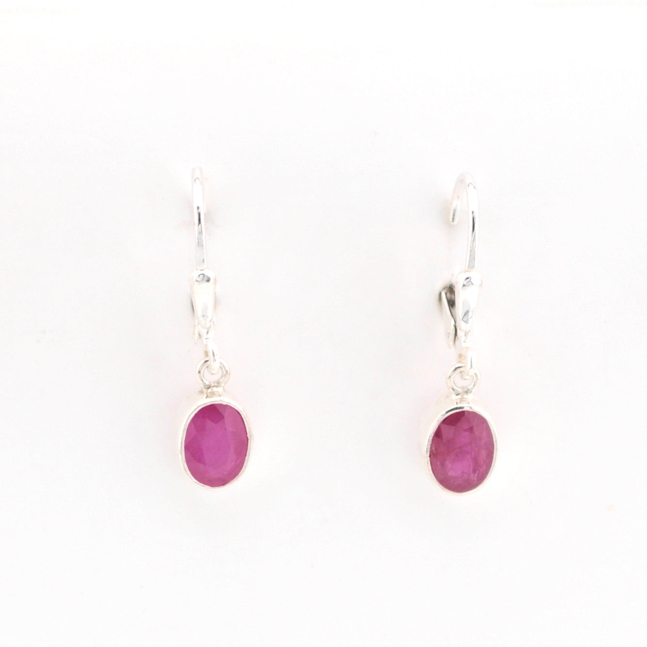 Front View Silver Ruby 5x7mm Oval Dangle Earrings