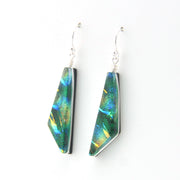 Colorful geometric earrings on a white background