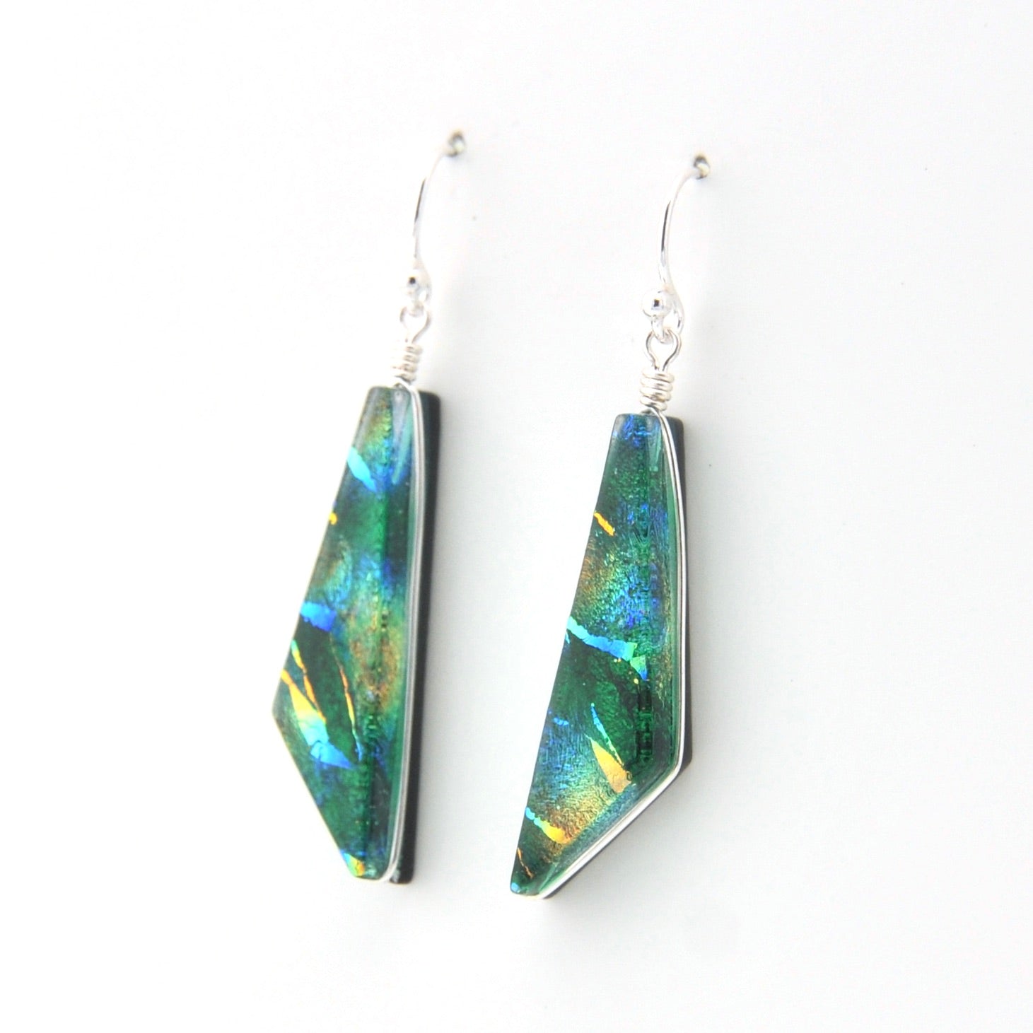 Colorful geometric earrings on a white background