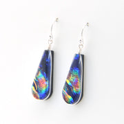 Teardrop-shaped earrings with colorful reflective surface on a white background
