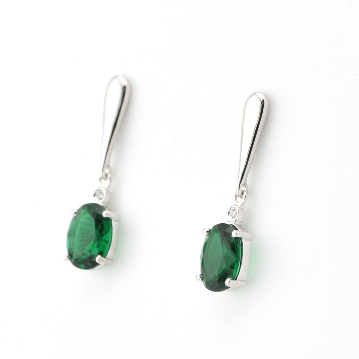 Side View Emerald 2.6ct Oval CZ Dangle Earrings