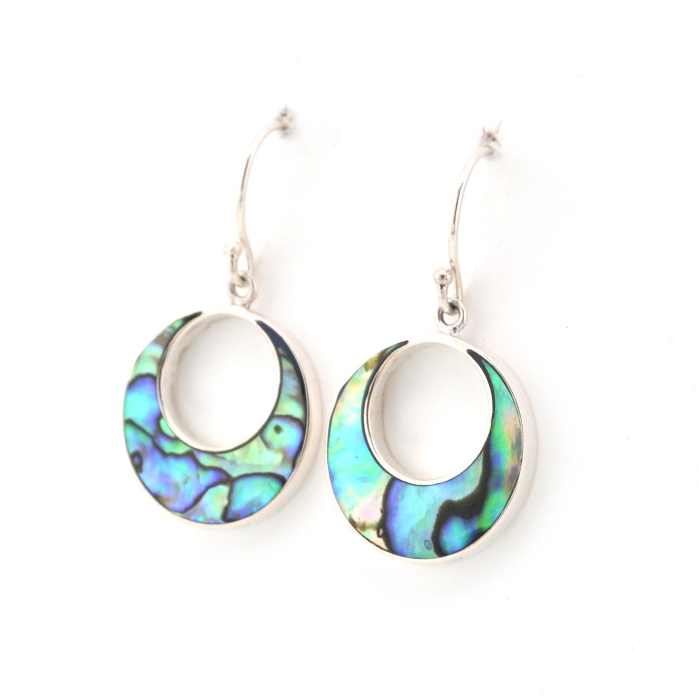 Pair of earrings with colorful circular designs on a white background