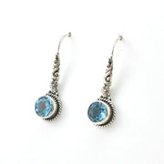 Side View Silver Blue Topaz 7mm Round Flower Dangle Earrings