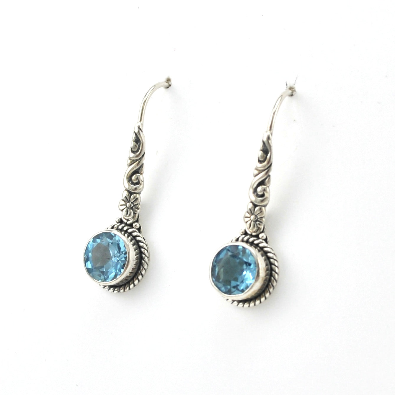 Side View Silver Blue Topaz 7mm Round Flower Dangle Earrings
