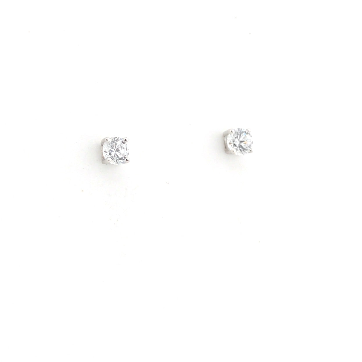 Pair of round crystal stud earrings on a white background