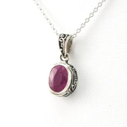 Side View Silver Ruby 6x8mm Oval Bali Necklace