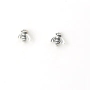 Silver bee-shaped earrings on a white background
