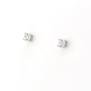 Pair of silver stud earrings with clear gemstones on a white background