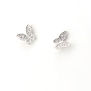 Pair of silver butterfly-shaped earrings on a white background