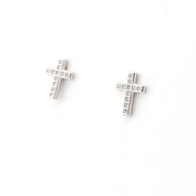 Pair of silver cross earrings on a white background