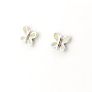 Butterfly-shaped earrings with opal stones on a white background