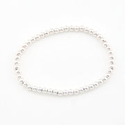 Silver bead bracelet on a white background