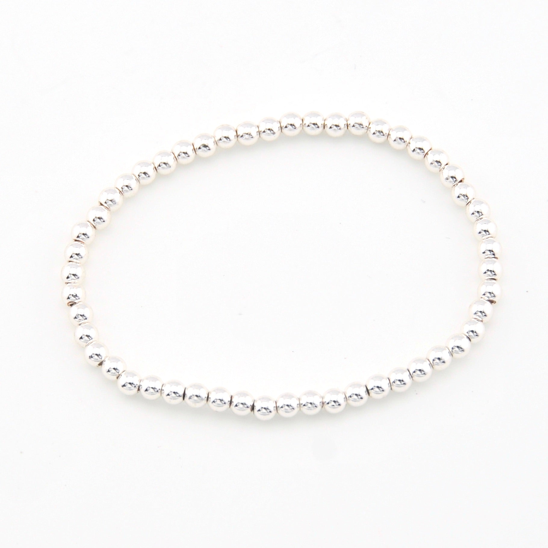 Silver bead bracelet on a white background