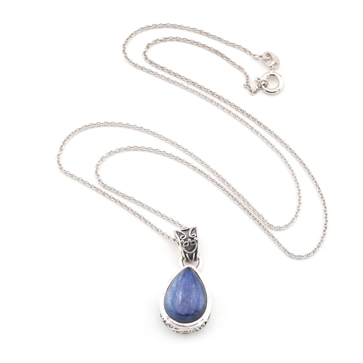 Necklace with a blue kyanite teardrop pendant on a white background