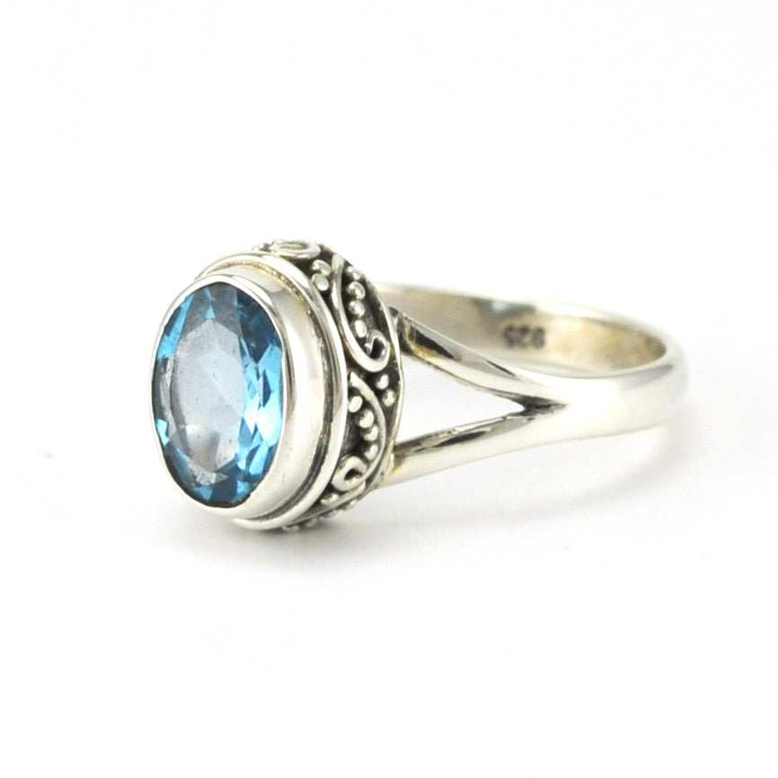 Sterling Silver Blue Topaz 7x9mm Oval Bali Ring