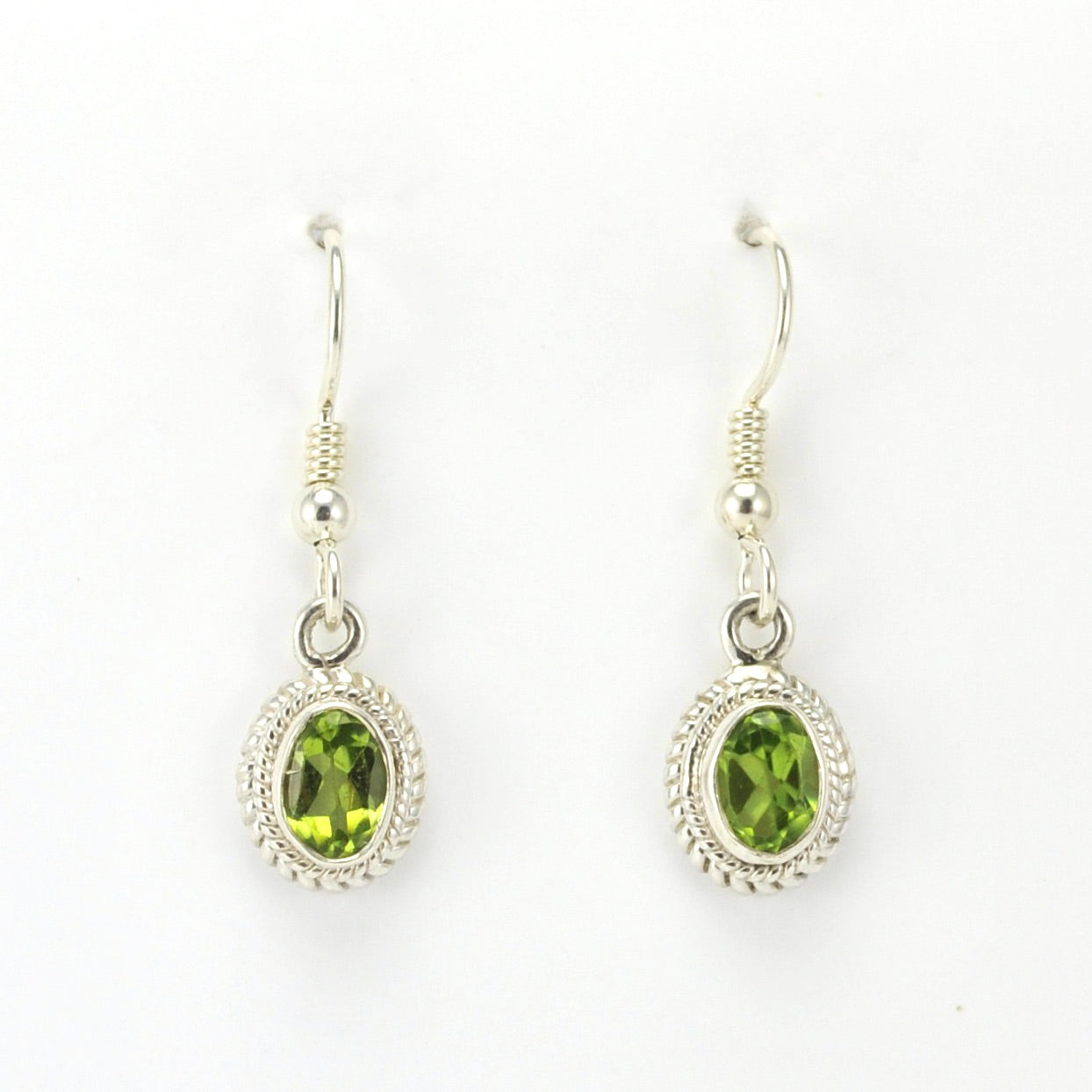 Alt View Sterling Silver Peridot 5x7mm Oval Dangle Earrings