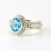 Sterling Silver Topaz 6x8mm Oval Ring