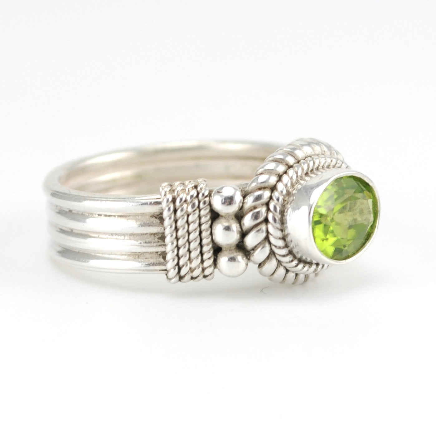 Side View Sterling Silver Peridot 6x8mm Oval Ring