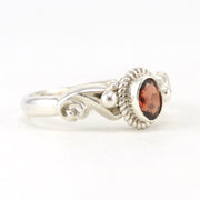 Side View Silver Garnet 4x6mm Oval Ring