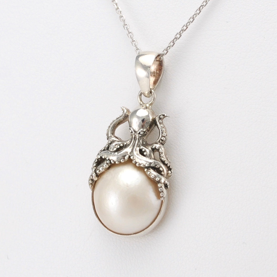Side View Silver Mabé Pearl Octopus Necklace