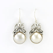 Alt View Silver Octopus Sitting on Mabé Pearl  Earrings