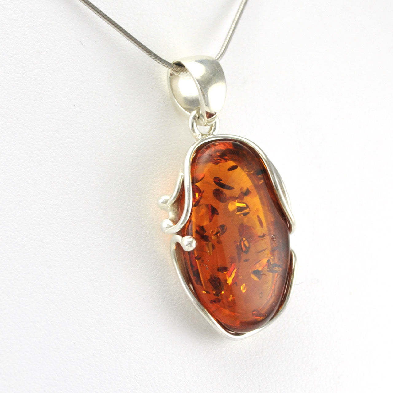 Side View Sterling Silver Amber Oval Pendant