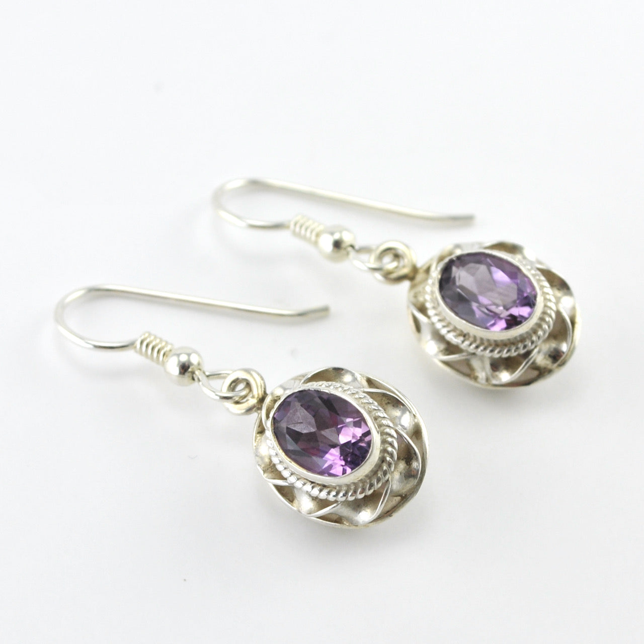 Side View Silver Amethyst Oval Ribbon Twist Earrings